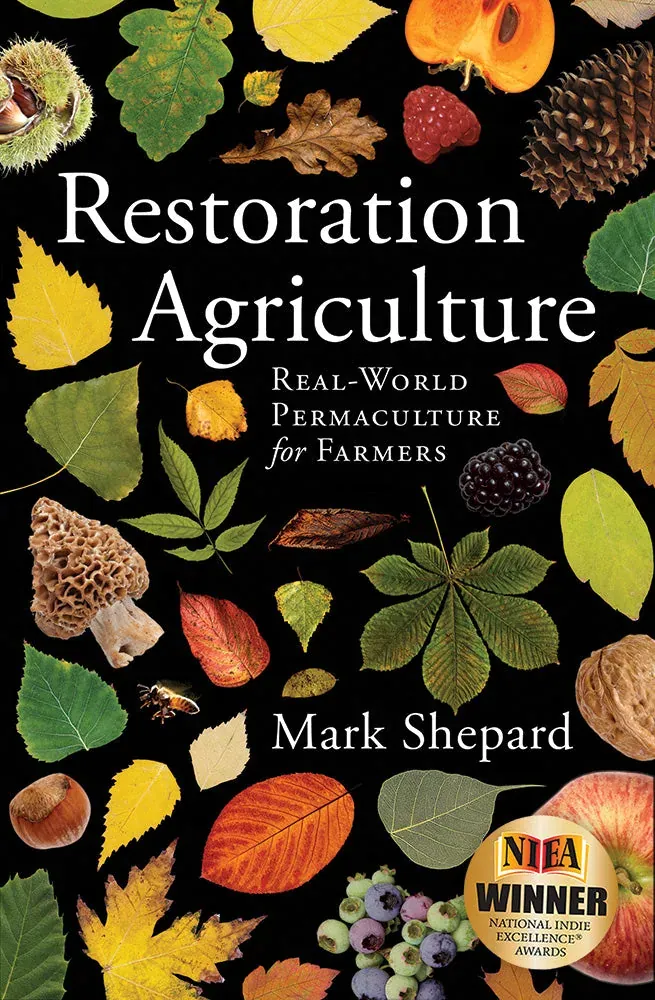 Restoration Agriculture (Mark Shepard): Front cover of Restoration Agriculture by Mark Shepard: leaves, nuts, fruit and a morel arranged on black, with the publisher's NIEA award seal at lower right.