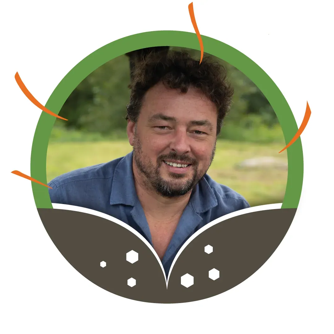 Dan Kittredge: Dan Kittredge smiling outdoors in a blue shirt, framed by the association's green circle and leaf graphic.