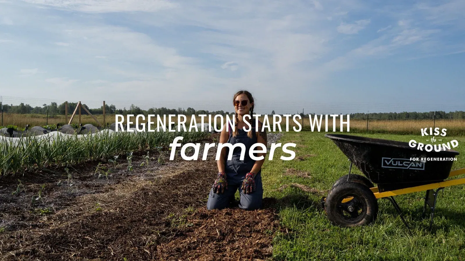 Kiss the Ground: Official channel banner: a smiling farmer kneeling on a mulched bed beside a wheelbarrow, with the text Regeneration starts with farmers and the Kiss the Ground logo.