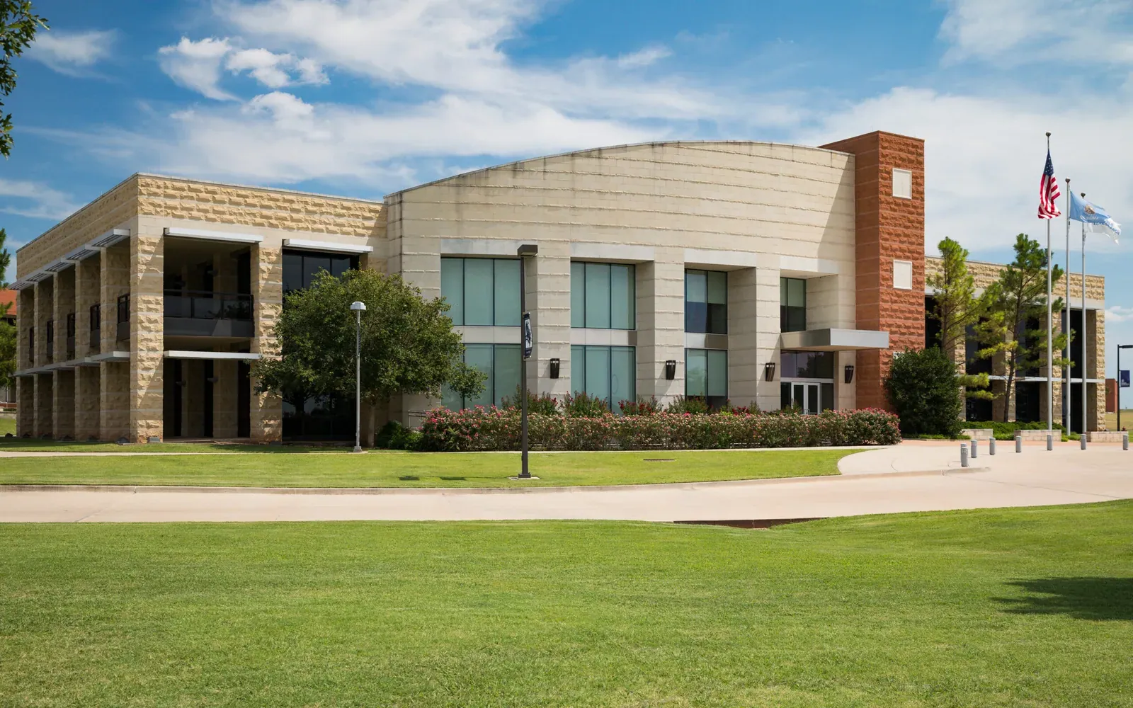 Noble Research Institute: A Noble Research Institute building on its Ardmore, Oklahoma campus with US and Oklahoma flags, the primary image of the institute's About page.